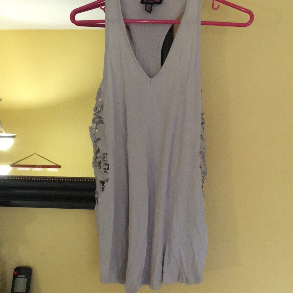 Gray tank top size medium sides open with mash